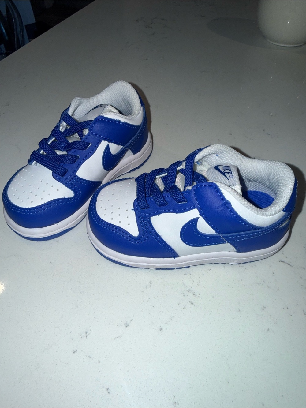 Nike toddler 4.5 Blue and White Low-Top Sneakers
